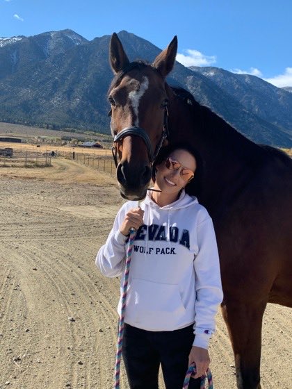 Kristin with her horse in the Nevada foothills